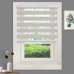 a window with a picture of a plant and a picture of a tree